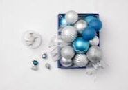 This <a href="https://www.pexels.com/photo/silver-and-blue-glimmering-baubles-placed-in-box-for-christmas-6102032/">Photo</a> was taken by <a href="https://www.pexels.com/@laura-james">Laura James</a> on Pexels.