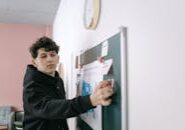 This <a href="https://www.pexels.com/photo/man-in-black-long-sleeve-shirt-holding-white-printer-paper-7213513/">Photo</a> was taken by <a href="https://www.pexels.com/@ivan-samkov">Ivan Samkov</a> on Pexels.