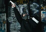 pexels-photo-7230408 This <a href="https://www.pexels.com/photo/a-woman-with-mask-holding-a-briefcase-and-gun-7230408/">Photo</a> was taken by <a href="https://www.pexels.com/@mart-production">MART PRODUCTION</a> on Pexels.