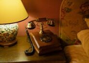 This <a href="https://www.pexels.com/photo/vintage-telephone-beside-the-bed-7609119/">Photo</a> was taken by <a href="https://www.pexels.com/@cottonbro">cottonbro studio</a> on Pexels.
