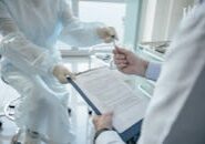 pexels-photo-8413294 This <a href="https://www.pexels.com/photo/doctor-handing-a-document-8413294/">Photo</a> was taken by <a href="https://www.pexels.com/@shvets-production">SHVETS production</a> on Pexels.